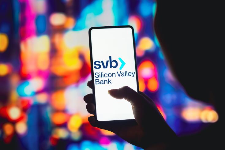 A Silicon Valley Bank logo on a phone screen